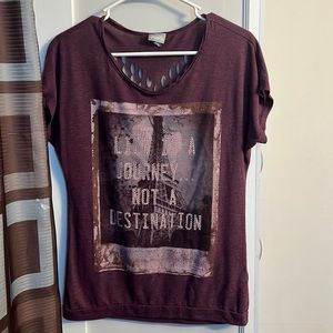 Very cute shirt with heart cut out on the back size L